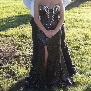 Size 6 prom dress sized down to fit a 4. Corset back.